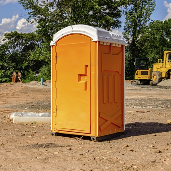 what is the cost difference between standard and deluxe portable restroom rentals in Woodburn